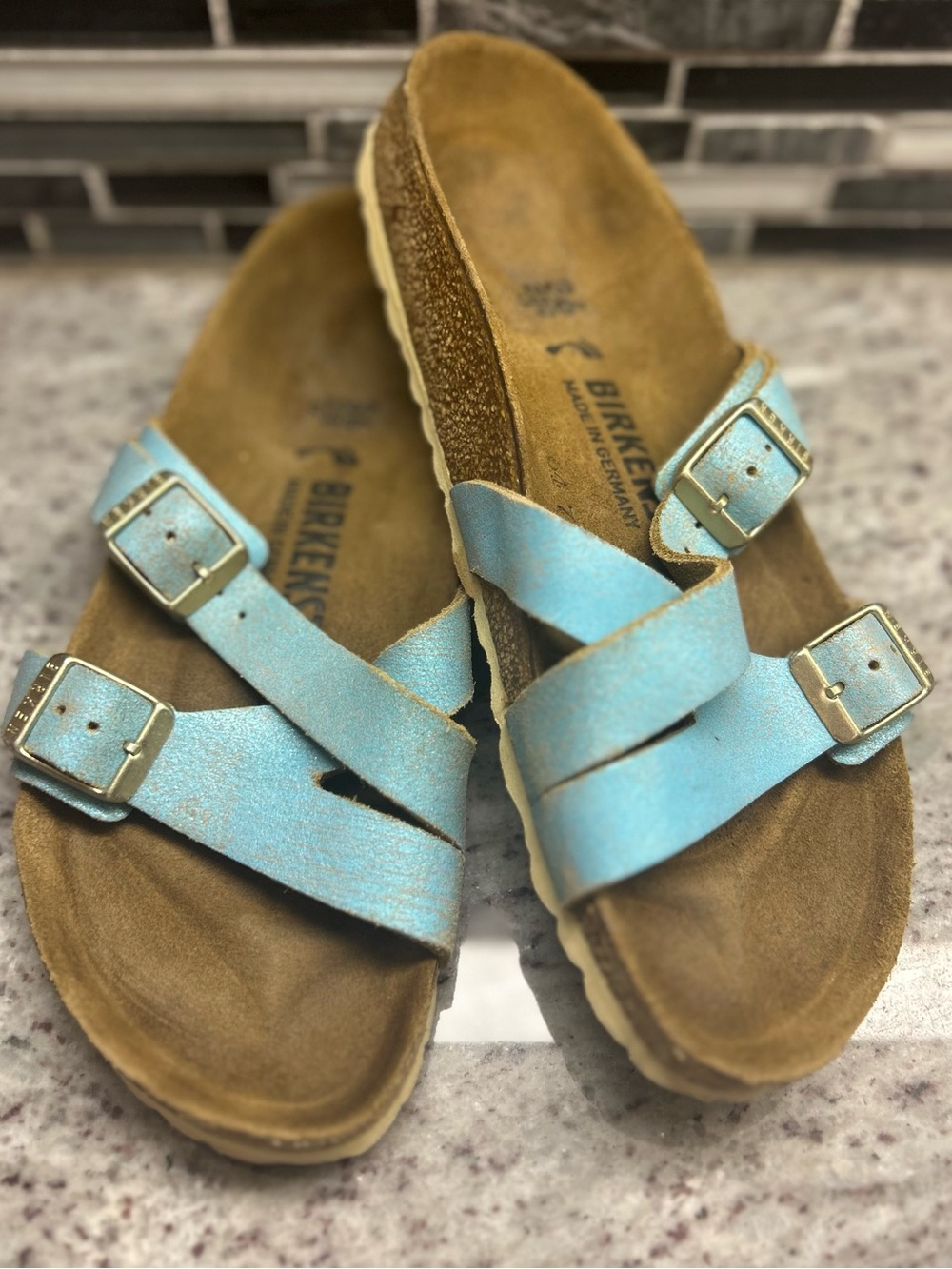 Birkenstock women Leather Yao metallic distressed aqua blue size 5(36) like new.